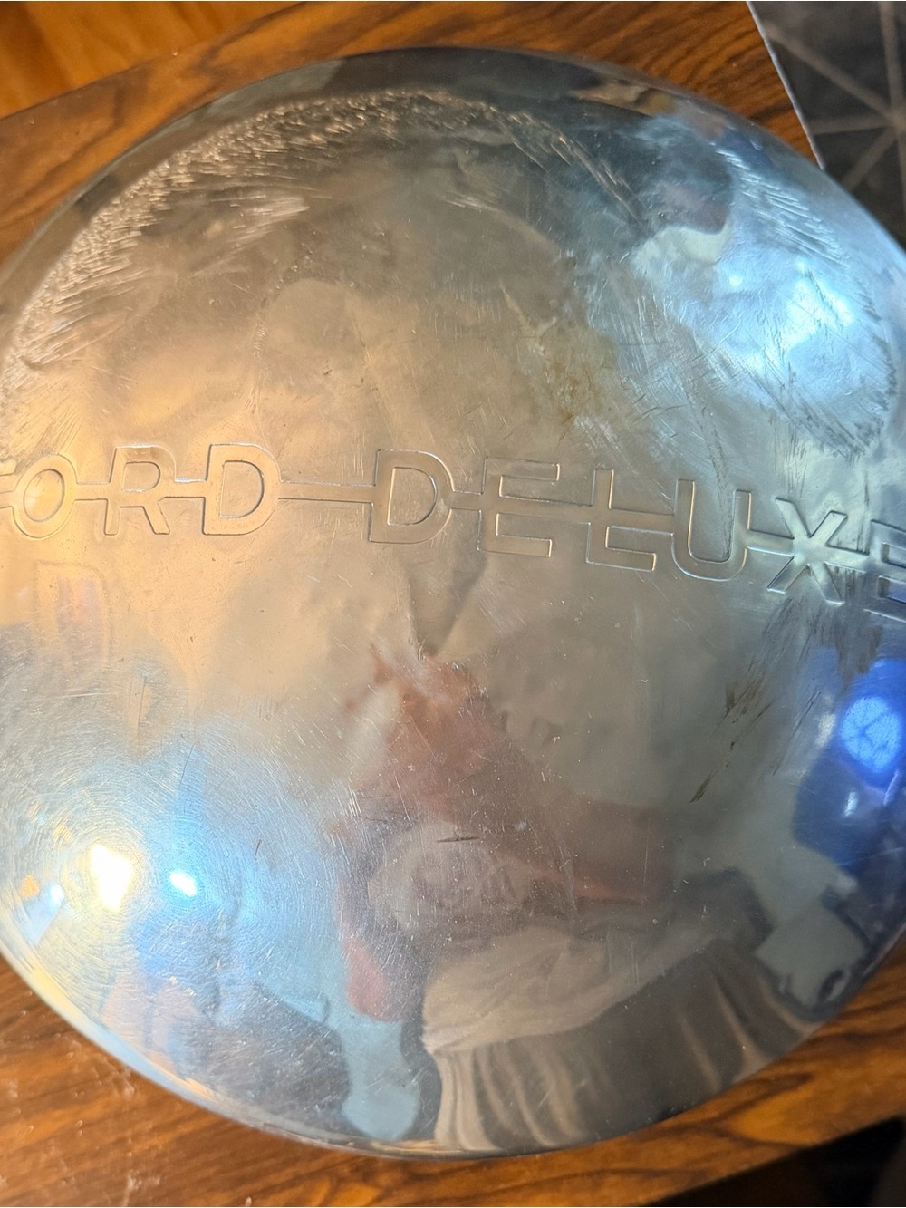 1940s Ford Deluxe "dog dish" style hubcap with Embossed FORD DELUXE